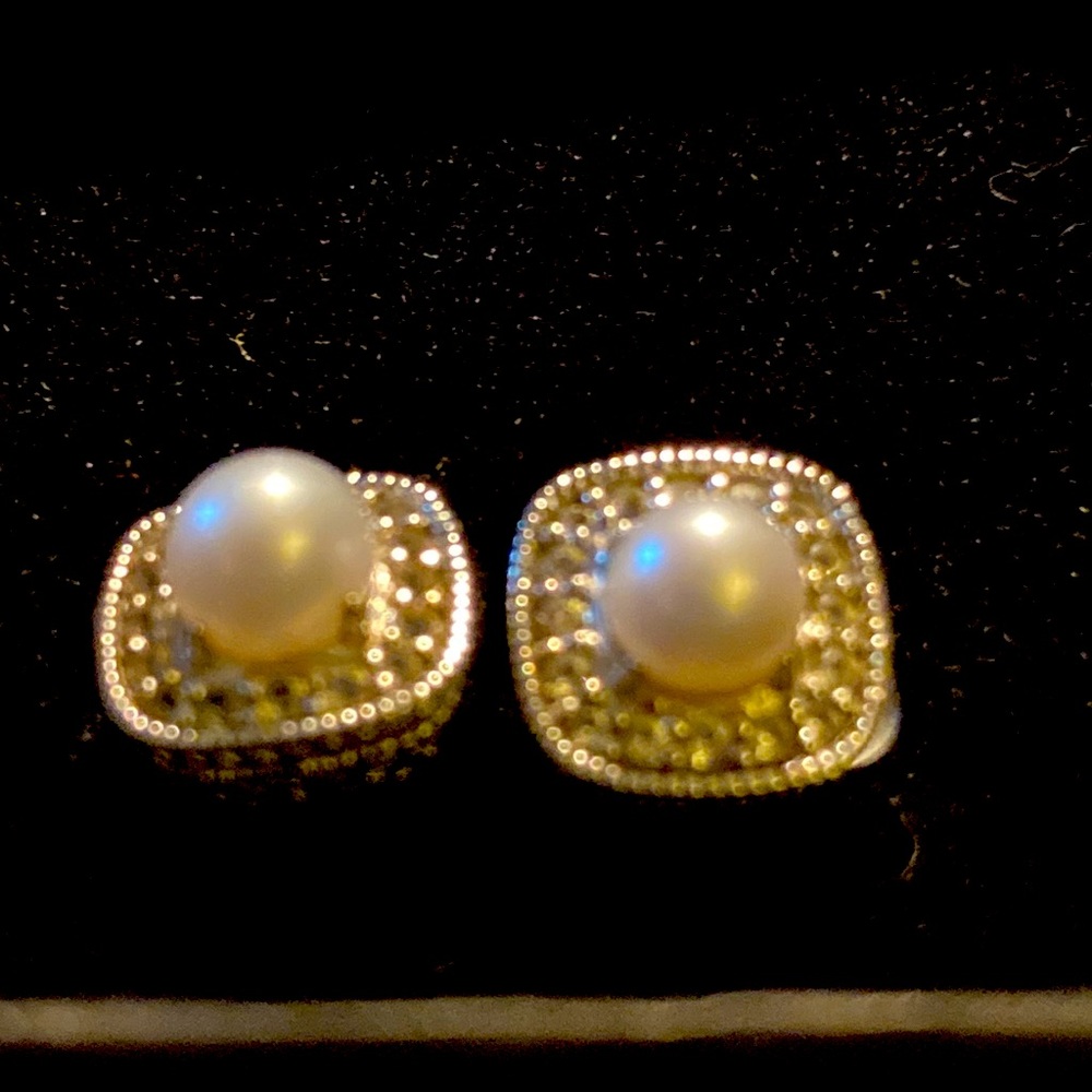 Diamond and pearl studs, never been worn